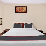 Capital O Hotel Grand Inn