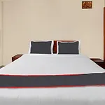 Capital O Hotel Grand Inn
