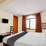 Capital O Hotel Grand Inn