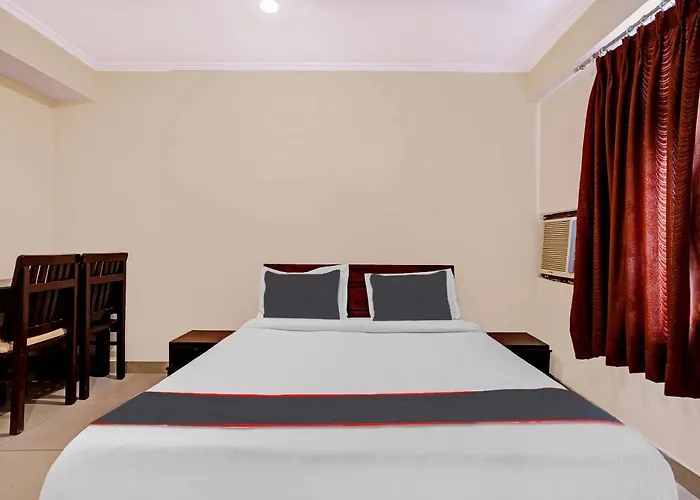 Capital O Hotel Grand Inn