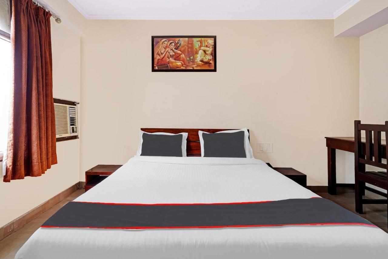 Capital O Grand Hotel
