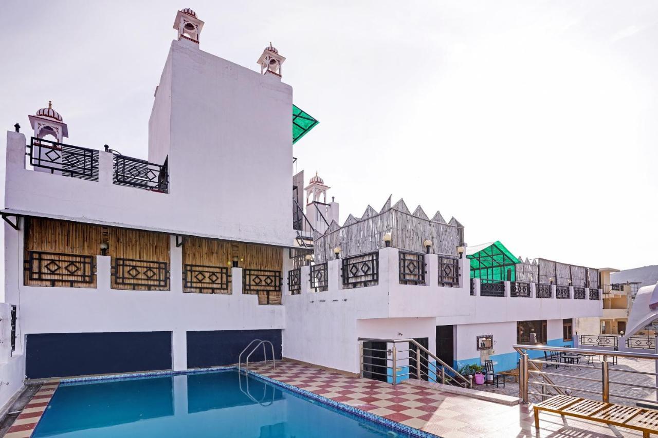Capital O Grand Hotel