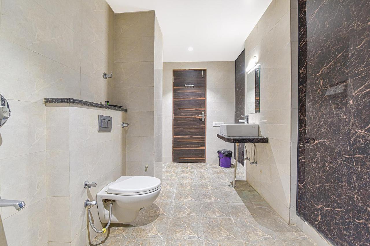 Fabhotel Prime Kaki