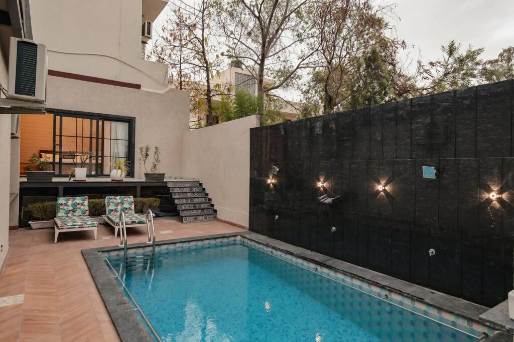 Saiba Outhouse- 4 Bed Room- Pool- Theatre- Partyhall- Garden & Terrace Sitting Area Holiday home *